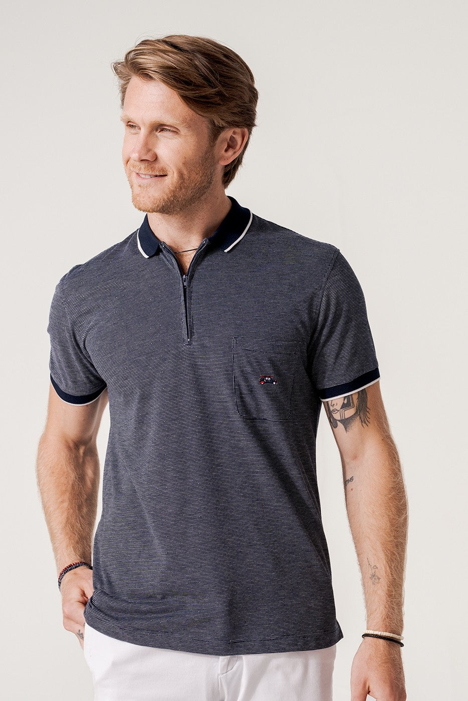 Polo jacquard marino manga corta cuello cremallera