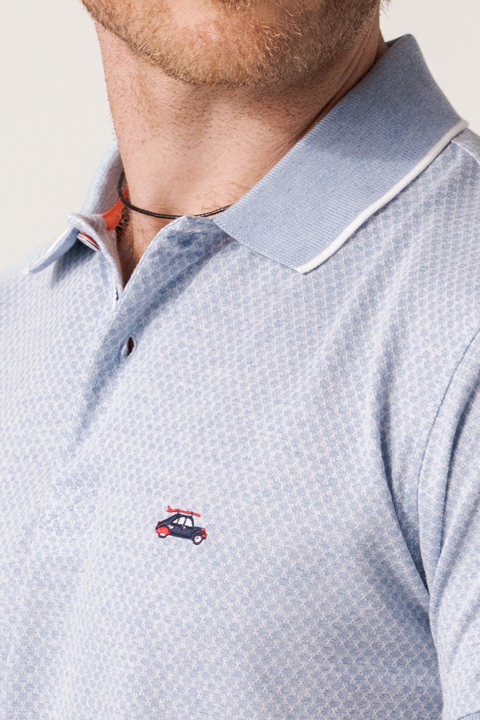 Polo jacquard textura manga corta color azul celeste